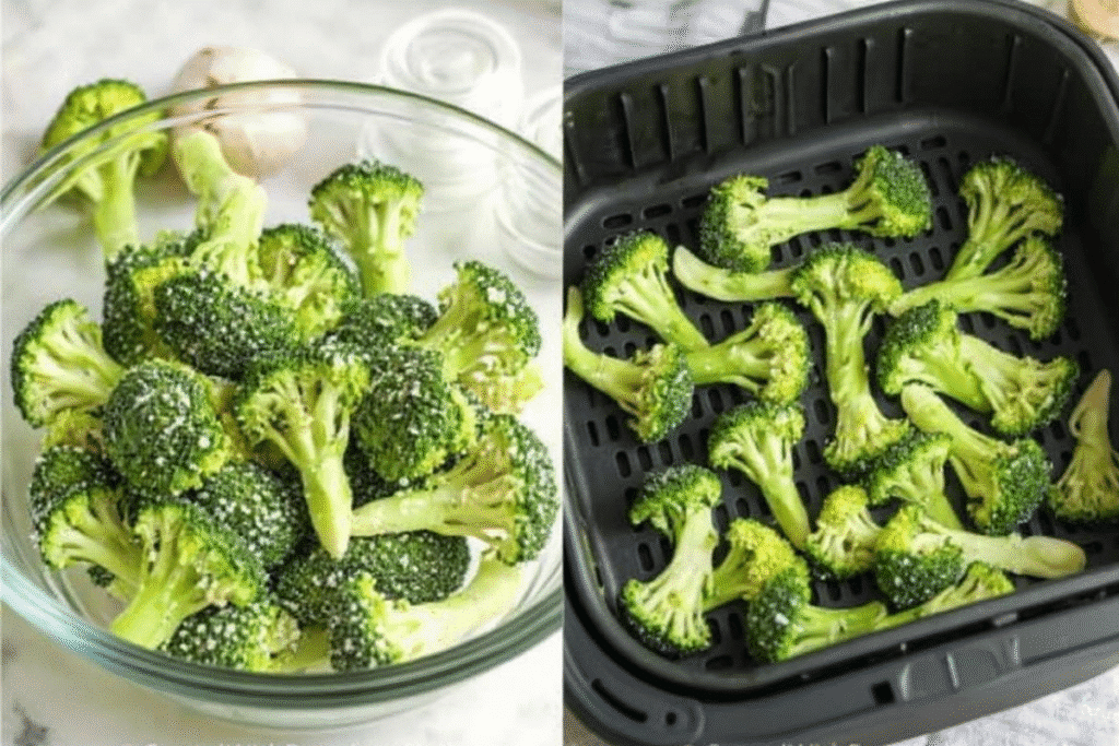 Crispy roasted broccoli florets in an air fryer basket.