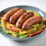 air fried chicken sausages with bell peppers