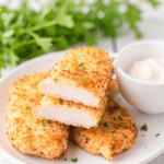Sliced ranch air fryer chicken breast with crispy breadcrumb coating